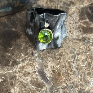 Large designer ring stamped inside green peridot size 8/9